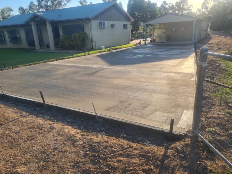 A brand new concrete driveway poured to fit two cars.
