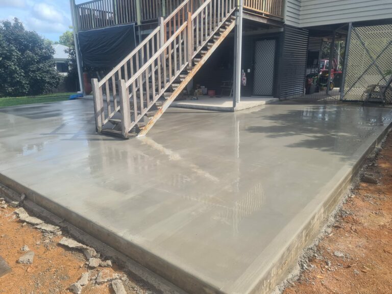 A concrete slab to expand off stairs and the foundations of the house.